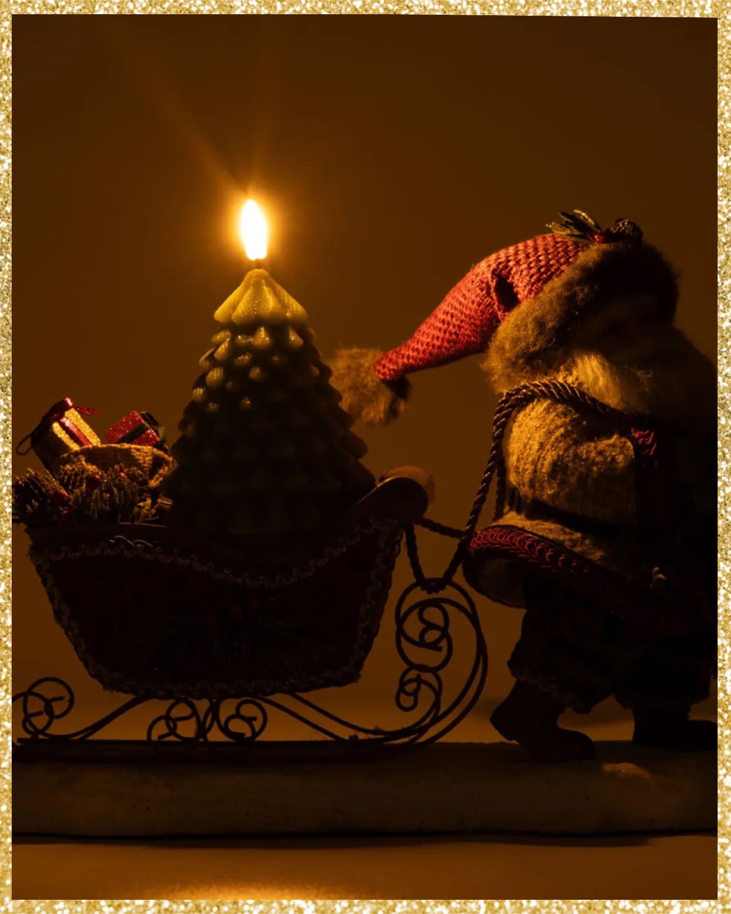 Katherine's Collection North Country Santa Pulling Sleigh Candle Holder Katherine's Collection Christmas Santa and Sleigh Candle Holder