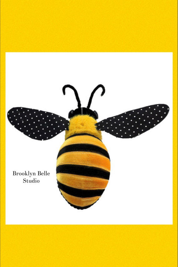Large Bumble Bee With Black And White Polka Dot Wings